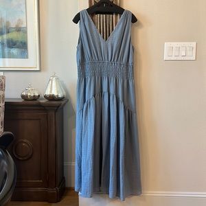 New with tags never worn. Shoulders altered a little bit to shorten.